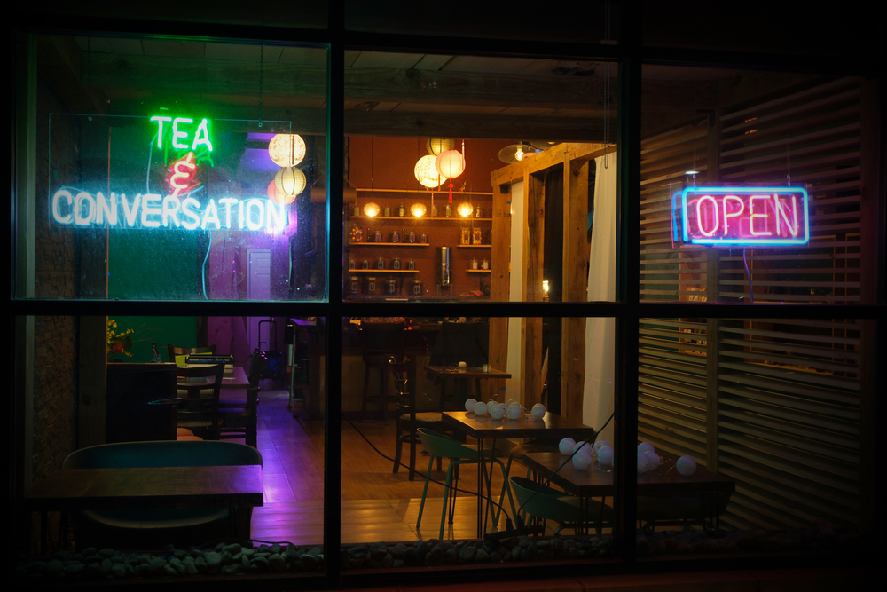 Moodily lit storefront of Great Lakes Tea.